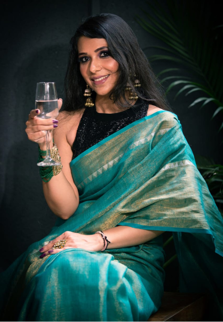 Teal Pure Tissue Linen Saree with Golden Temple Border
