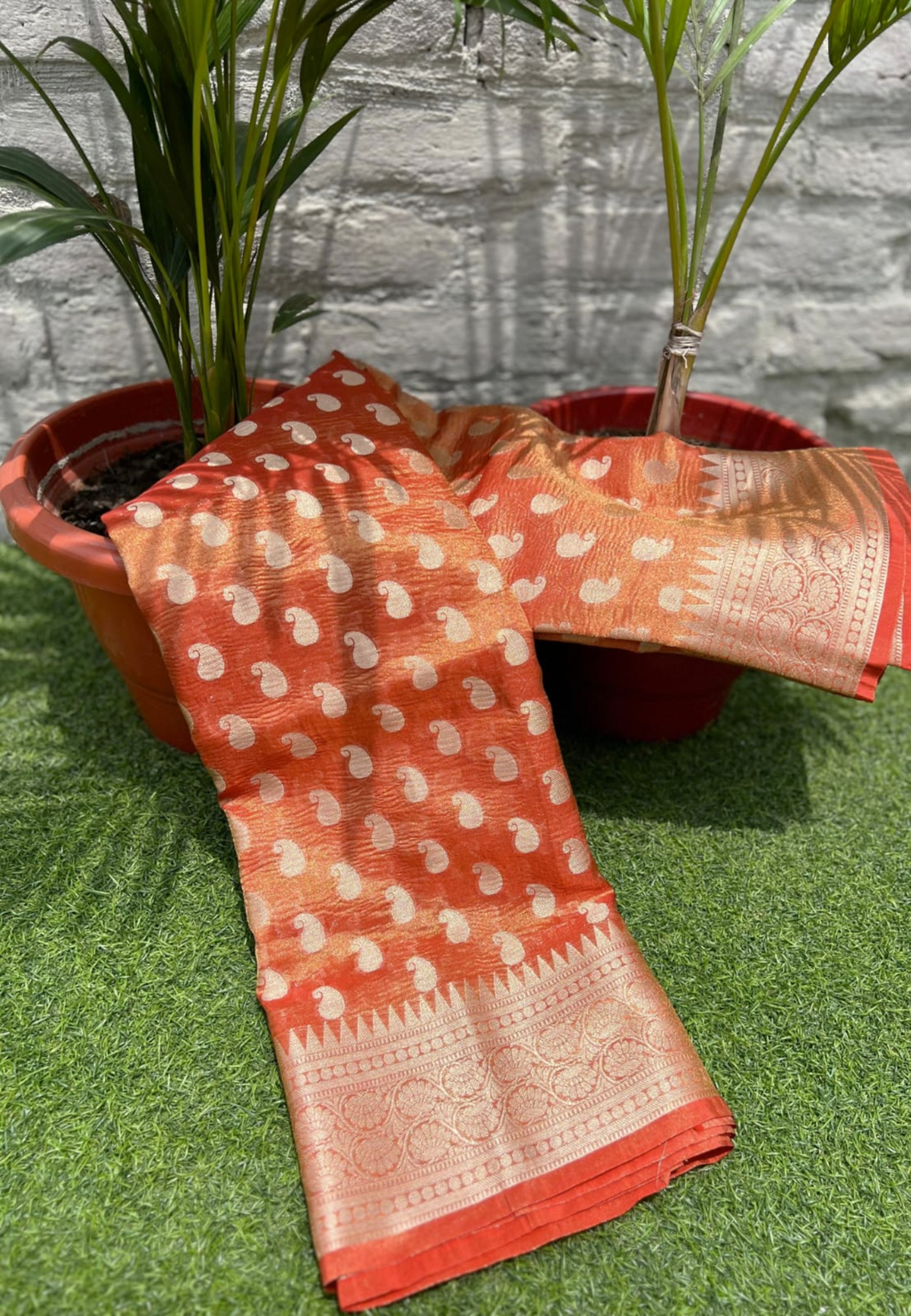 Orange Semi Tissue Silk Saree with Rich Woven Zari Border
