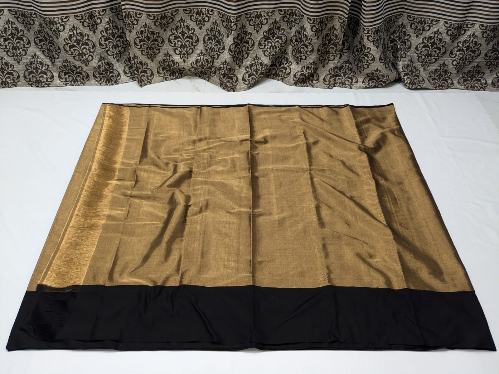Golden Tissue Handloom Saree with Dual Zari Weave and Black Border