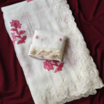 White Silk Saree with Pink Flower Design